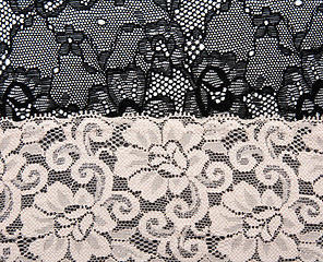 Image showing Black and beige lace with pattern flower