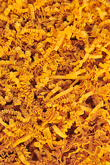 Image showing Detail of orange shredded packaging paper - background