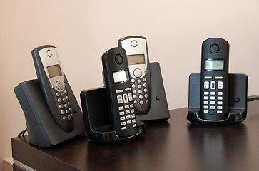 Image showing Phones on holders