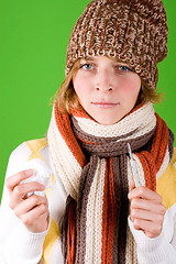 Image showing woman with handkerchief and thermometer 