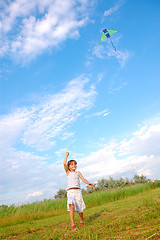 Image showing girl playing with a kite