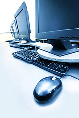 Image showing workplace room with computers in row 