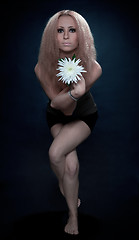 Image showing yoga pose with white flower