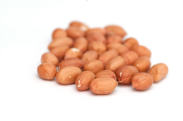 Image showing fresh roasted peanuts on a white background