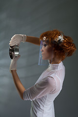 Image showing laboratory woman examining detail