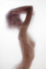 Image showing Beautiful woman washing hair in shower