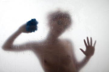 Image showing Sexy woman taking a shower s