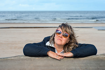 Image showing Woman relaxing at the sea.