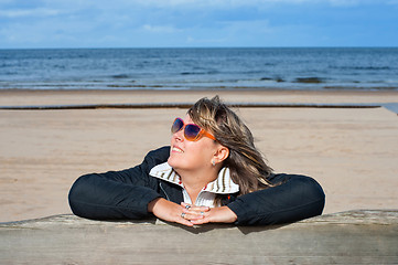 Image showing Woman relaxing at the sea.