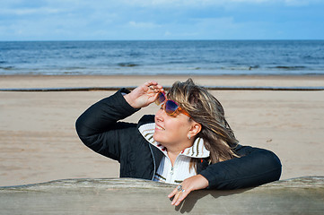 Image showing Woman relaxing at the sea.