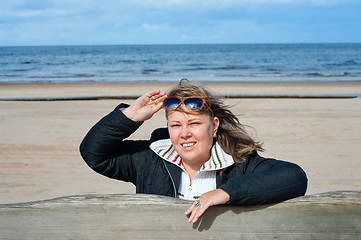 Image showing Woman relaxing at the sea.