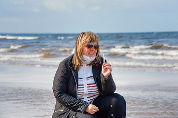 Image showing Woman relaxing at the sea.