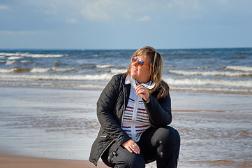 Image showing Woman relaxing at the sea.