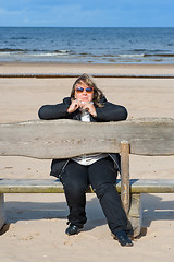 Image showing Woman relaxing at the sea.