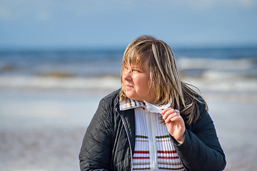 Image showing Woman relaxing at the sea.