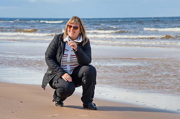 Image showing Woman relaxing at the sea.