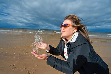 Image showing Adult woman at the sea