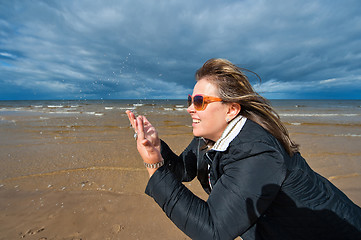 Image showing Adult woman at the sea