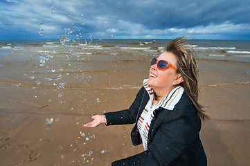 Image showing Adult woman at the sea