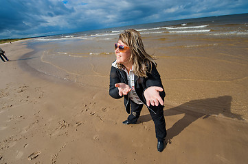 Image showing Adult woman at the sea