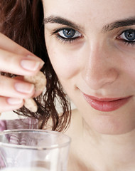 Image showing Young people eating milk with cereals