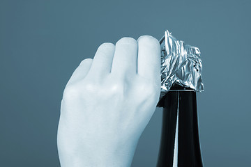 Image showing Opening champagne bottle