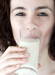 Image showing Young people eating milk.