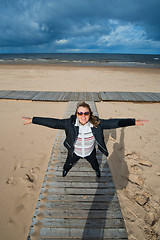 Image showing Adult woman at the sea