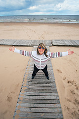 Image showing Adult woman at the sea