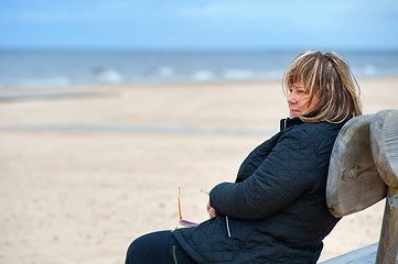 Image showing Adult woman at the sea