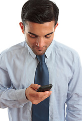 Image showing Businessman texting SMS