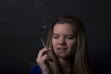 Image showing smoking girl