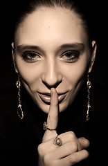 Image showing Woman making silence gesture