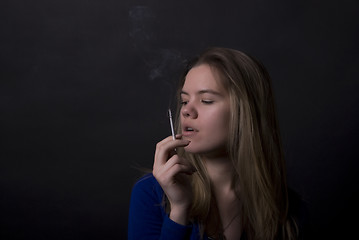 Image showing smoking girl