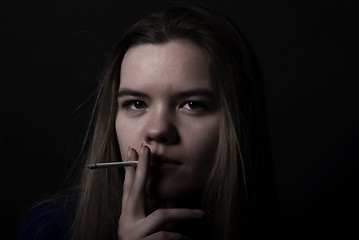 Image showing Smoking girl