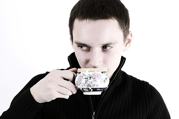 Image showing young man with a cup of tea
