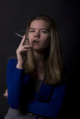 Image showing smoking girl