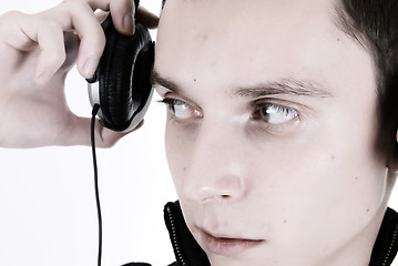 Image showing Young man in headphones  