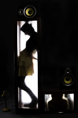 Image showing A girl behind the glass door           