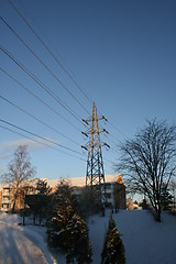 Image showing Power lines and block of flats