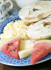 Image showing Caribbean breakfast bagel cream cheese with tropical fruit