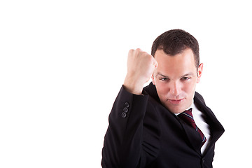 Image showing business man with arm raised in victory sign