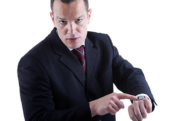 Image showing businessman pointing to the watch,