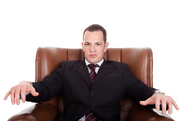 Image showing Businessman upset seated on a chair
