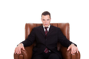 Image showing Businessman seated on a chair