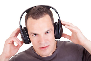 Image showing man listening music in headphones