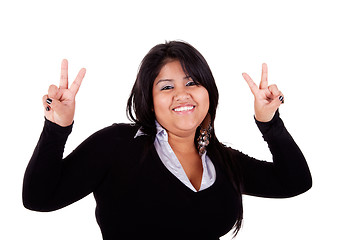 Image showing happy large  latin woman, with thumbs raised as a sign of victory