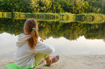 Image showing child relaxing on the beach