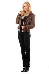 Image showing Smiling young blonde in a black pants