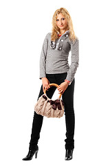 Image showing Smiling young blonde with a handbag